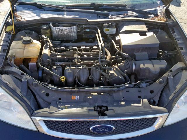 1FAFP34N75W306037 - 2005 FORD FOCUS ZX4 BLACK photo 7