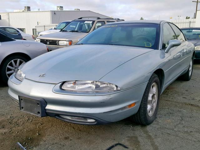 1G3GR62CXV4117163 - 1997 OLDSMOBILE AURORA BLUE photo 2