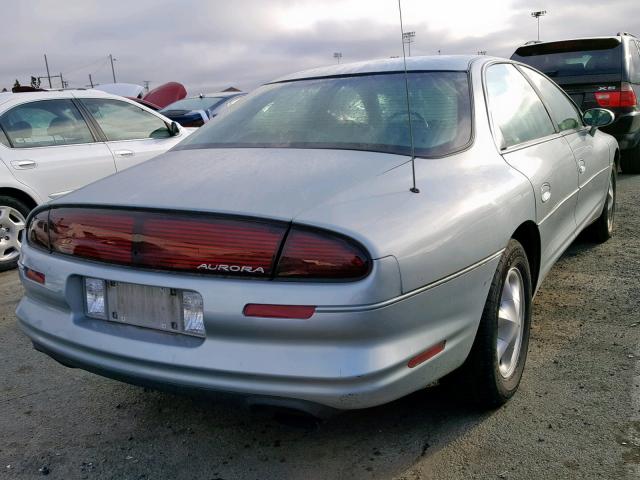 1G3GR62CXV4117163 - 1997 OLDSMOBILE AURORA BLUE photo 4