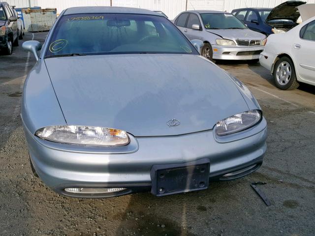 1G3GR62CXV4117163 - 1997 OLDSMOBILE AURORA BLUE photo 9