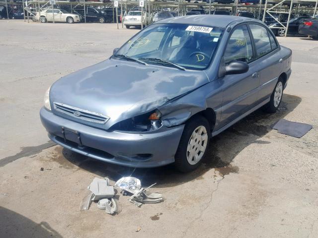 KNADC123726086538 - 2002 KIA RIO BLUE photo 2