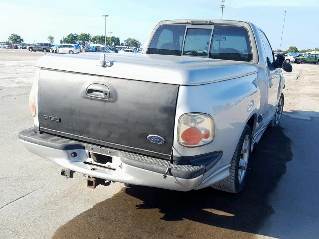 2FTZF07372CA36348 - 2002 FORD F150 SVT L SILVER photo 4