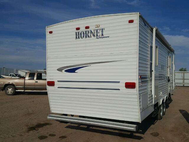 4YDT28F264E311078 - 2004 KEYSTONE HORNET WHITE photo 4
