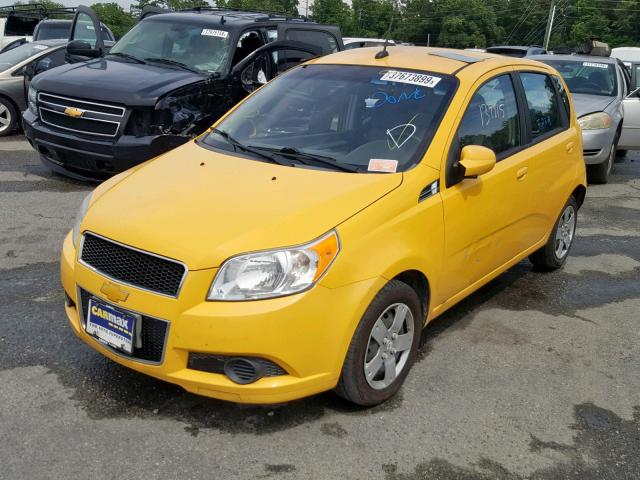 KL1TD6DE5BB147276 - 2011 CHEVROLET AVEO LS YELLOW photo 2