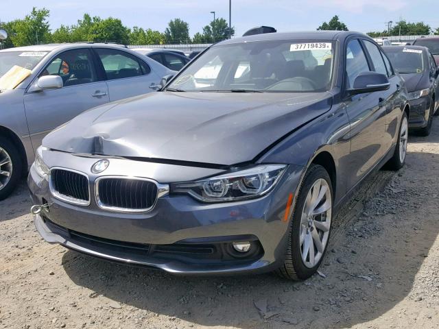 WBA8E5G54JNV01946 - 2018 BMW 320 XI GRAY photo 2