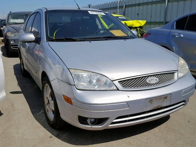 1FAFP38Z06W186130 - 2006 FORD FOCUS ZX4 SILVER photo 1