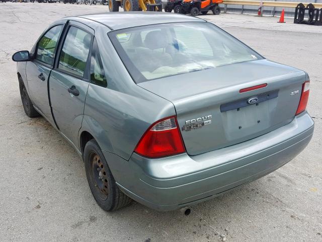 1FAFP34N85W110849 - 2005 FORD FOCUS ZX4 GREEN photo 3