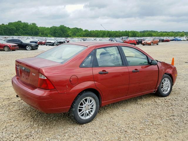 1FAFP34N15W301058 - 2005 FORD FOCUS ZX4 RED photo 4