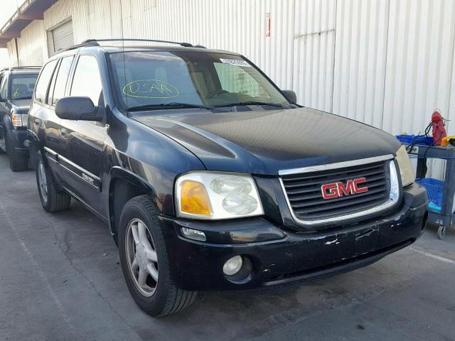 1GKDS13S642163913 - 2004 GMC ENVOY BLACK photo 1