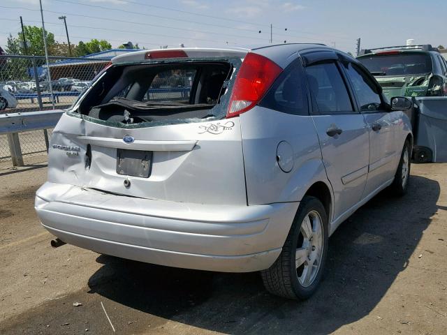 1FAHP37NX7W332168 - 2007 FORD FOCUS ZX5 SILVER photo 4