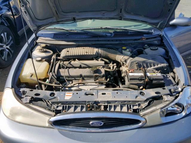 1FAFP6533XK211385 - 1999 FORD CONTOUR LX BLUE photo 7