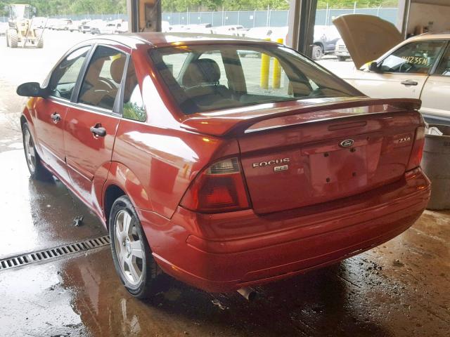 1FAHP34NX5W173718 - 2005 FORD FOCUS ZX4 RED photo 3