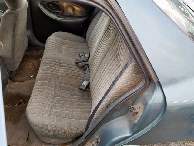 1G2NE52T6VC783556 - 1997 PONTIAC GRAND AM S GREEN photo 6