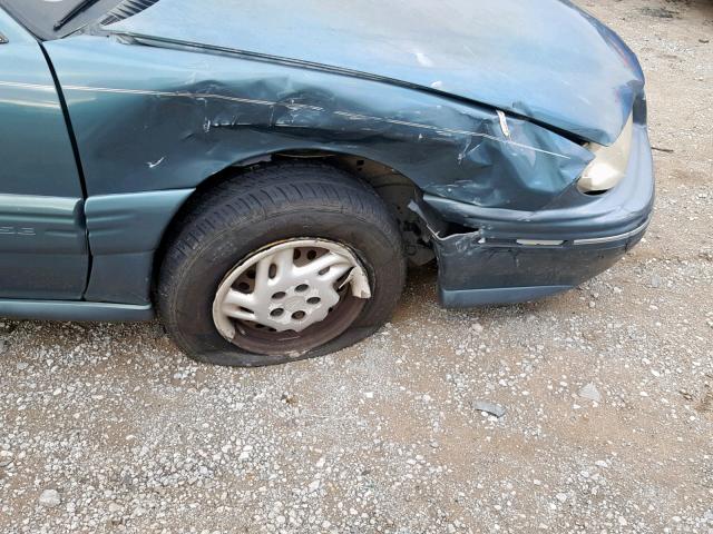 1G2NE52T6VC783556 - 1997 PONTIAC GRAND AM S GREEN photo 9