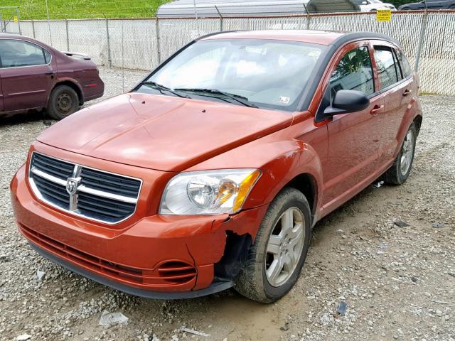 1B3HB48A69D184658 - 2009 DODGE CALIBER SX ORANGE photo 2