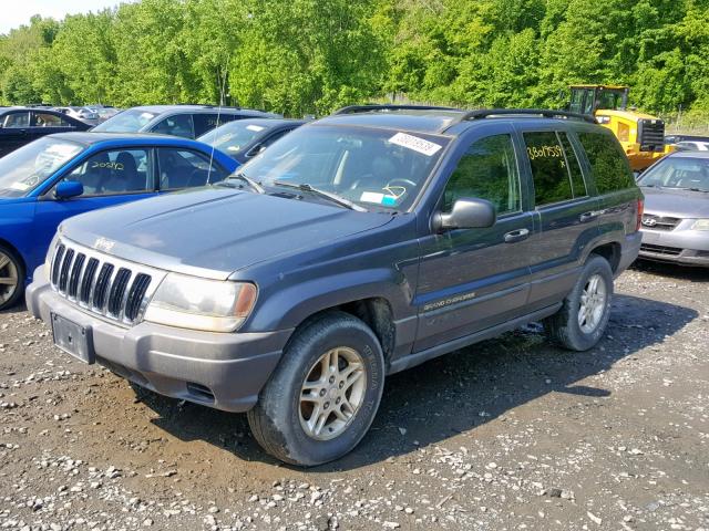 1J4GW48N42C249868 - 2002 JEEP GRAND CHER BLUE photo 2