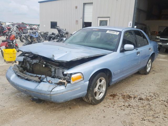 2FAFP74W7YX214399 - 2000 FORD CROWN VICT BLUE photo 2