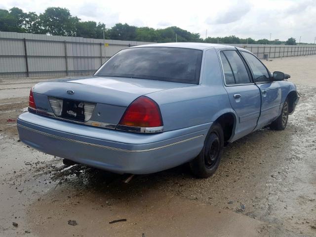 2FAFP74W7YX214399 - 2000 FORD CROWN VICT BLUE photo 4