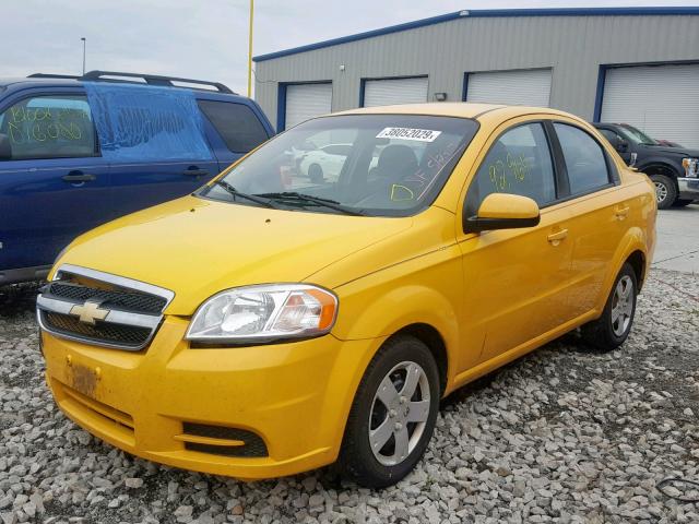 KL1TD5DE1BB168569 - 2011 CHEVROLET AVEO LS YELLOW photo 2