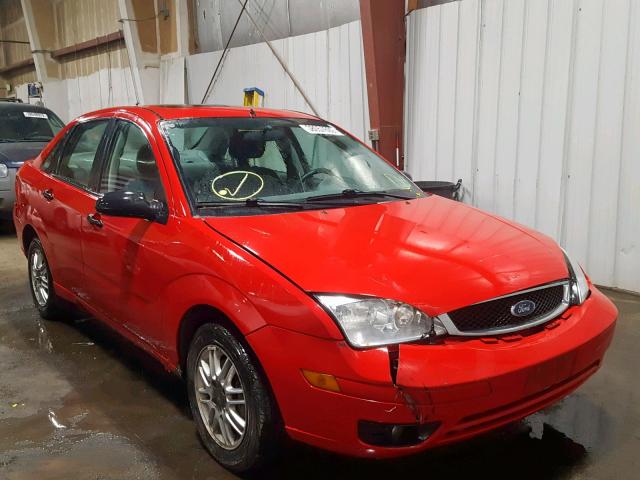 1FAFP34N05W194097 - 2005 FORD FOCUS ZX4 RED photo 1