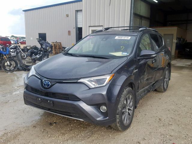 JTMRJREV0JD156370 - 2018 TOYOTA RAV4 HV LE GRAY photo 2