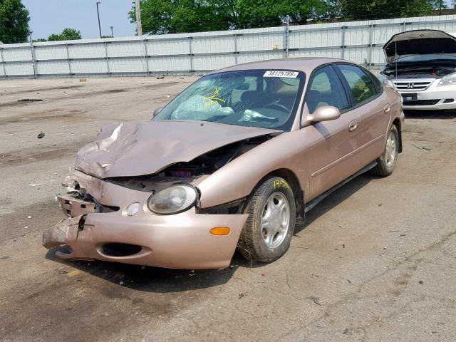 1FALP52UXVG165211 - 1997 FORD TAURUS GL TAN photo 2