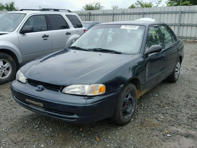 1Y1SK5289XZ441890 - 1999 CHEVROLET GEO PRIZM GREEN photo 2