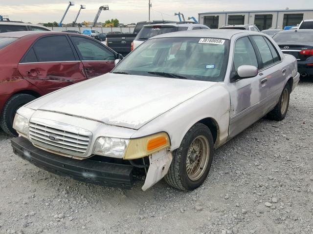 2FAFP74W1YX214379 - 2000 FORD CROWN VICT SILVER photo 2