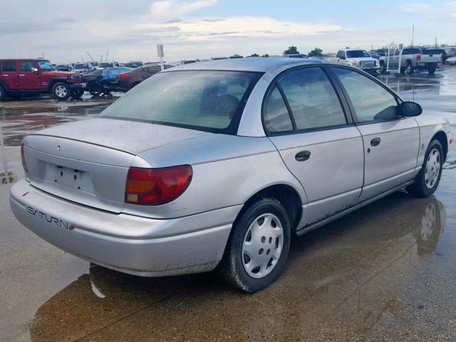 1G8ZH52832Z158311 - 2002 SATURN SL1 SILVER photo 4