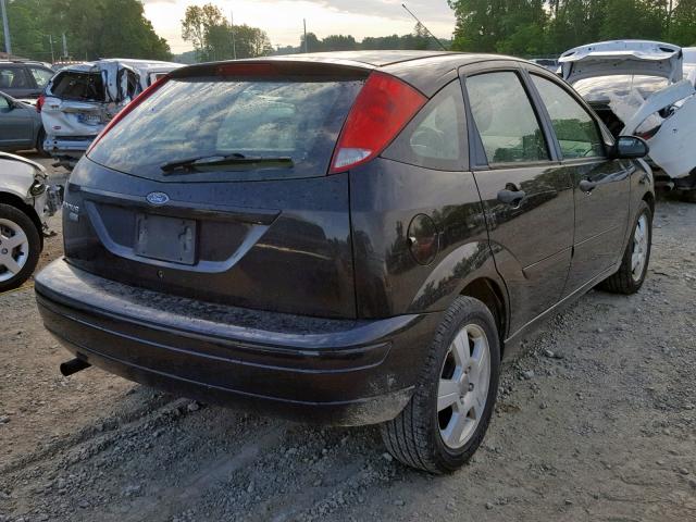 1FAHP37N77W316025 - 2007 FORD FOCUS ZX5 BLACK photo 4