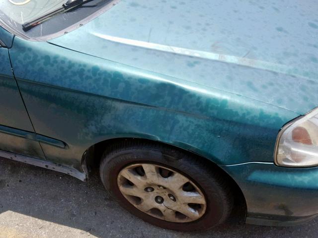 2HGEJ6611YH567400 - 2000 HONDA CIVIC BASE TEAL photo 9