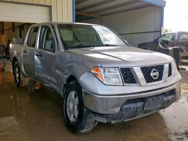 1N6AD07W05C462614 - 2005 NISSAN FRONTIER C SILVER photo 1