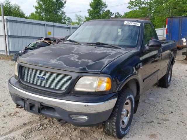 2FTRF18L6XCA40726 - 1999 FORD F150 BLACK photo 2