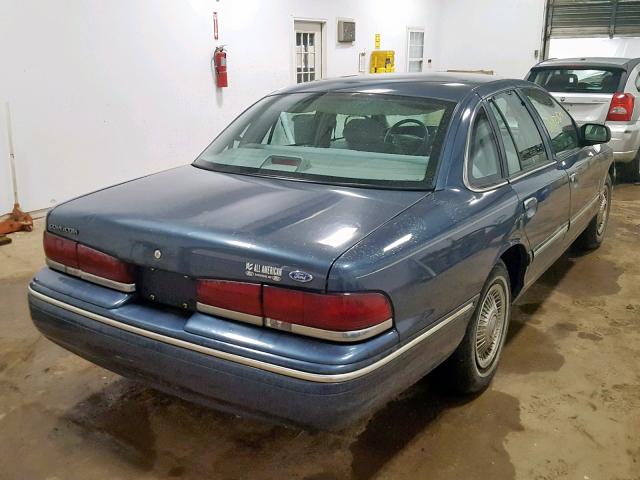 2FALP73W9VX160815 - 1997 FORD CROWN VICT BLUE photo 4