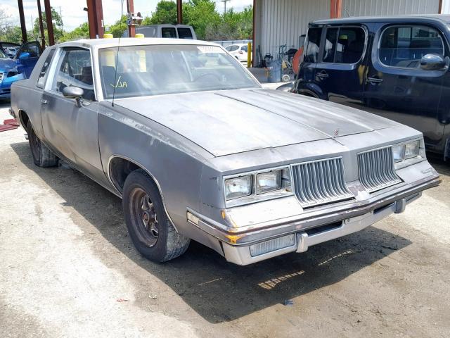 1G3AR47A9EM366006 - 1984 OLDSMOBILE CUTLASS SU GRAY photo 1