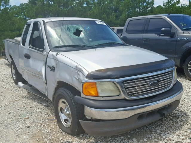 2FTRX17W64CA39130 - 2004 FORD F-150 HERI SILVER photo 1