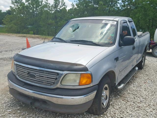 2FTRX17W64CA39130 - 2004 FORD F-150 HERI SILVER photo 2