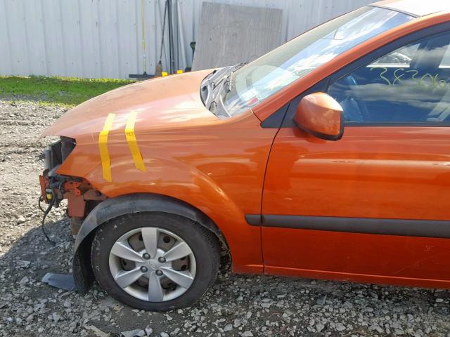 KNADE223496537144 - 2009 KIA RIO BASE ORANGE photo 9