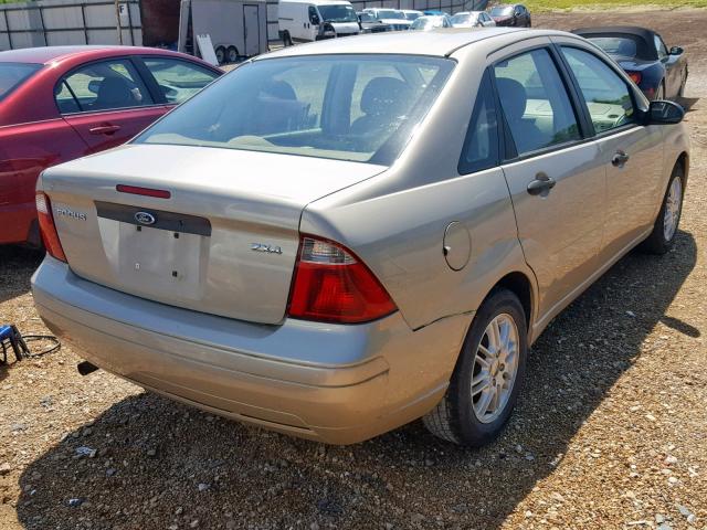 1FAFP34N06W128618 - 2006 FORD FOCUS ZX4 TAN photo 4