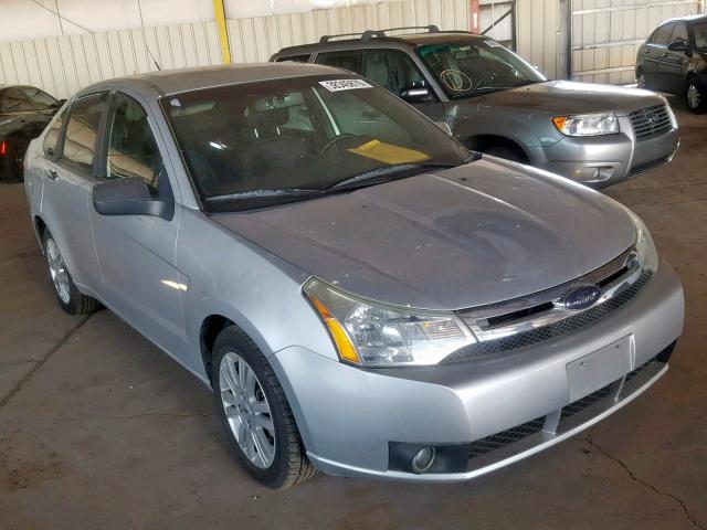 1FAHP3HN7AW207988 - 2010 FORD FOCUS SEL SILVER photo 1