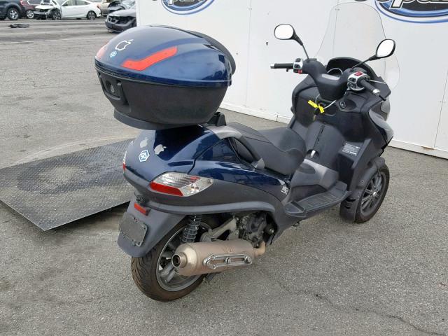 ZAPM590T195000816 - 2009 PIAGGIO MP3 400 BLUE photo 4