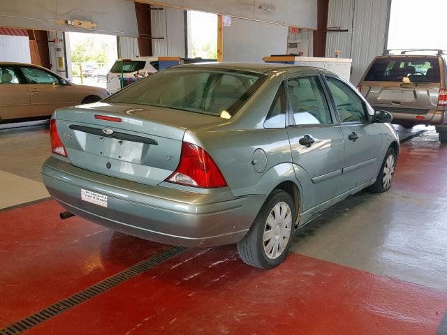 1FAFP34Z64W132561 - 2004 FORD FOCUS SE C GRAY photo 4