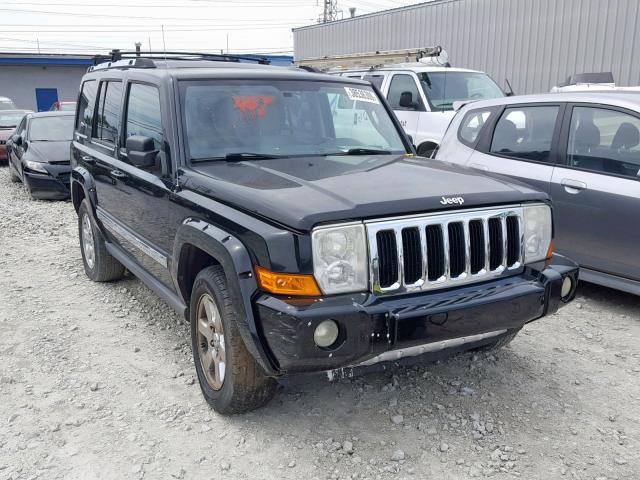 1J8HG58256C366747 - 2006 JEEP COMMANDER BLACK photo 1