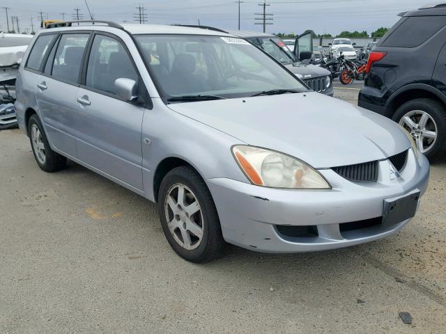 JA3AD29F44U025931 - 2004 MITSUBISHI LANCER LS SILVER photo 1