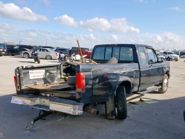 1FTJX35F0VED12148 - 1997 FORD F350 BLACK photo 4