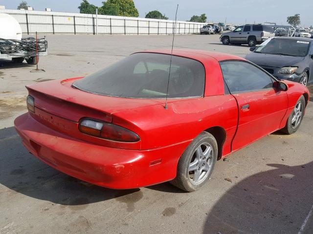 2G1FP22K7V2135653 - 1997 CHEVROLET CAMARO BAS RED photo 4