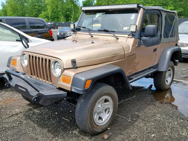 1J4FY29P5XP421531 - 1999 JEEP WRANGLER / BROWN photo 2