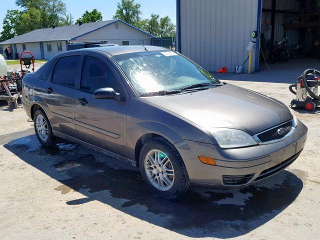 1FAFP34N95W191277 - 2005 FORD FOCUS ZX4 GRAY photo 1