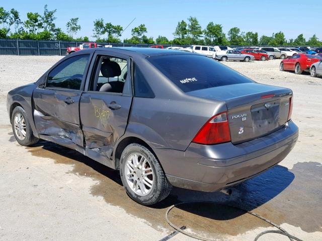 1FAFP34N95W191277 - 2005 FORD FOCUS ZX4 GRAY photo 3