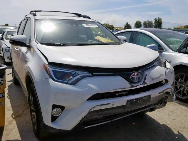 JTMRJREVXJD228689 - 2018 TOYOTA RAV4 HV LE WHITE photo 1